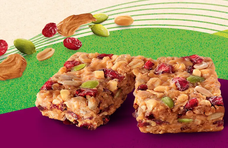 Nature Valley Packed Sustained Energy Bar unwrapped and close-up to show texture.