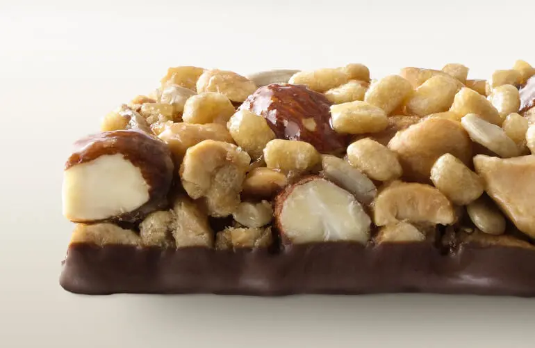 Close up of unwrapped Nature Valley gluten-free protein bar.